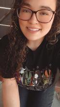 A smiling photo of Laura